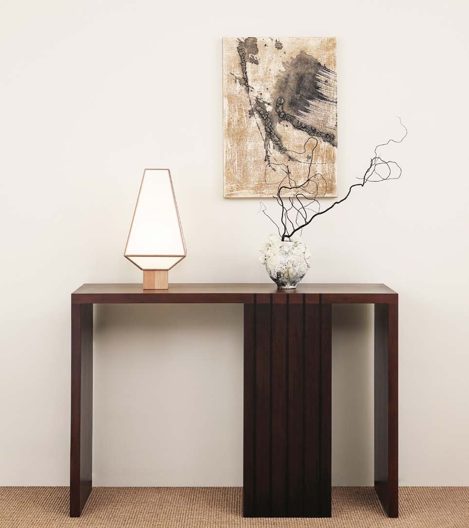 Console table vignette in walnut, with sculpture and artwork